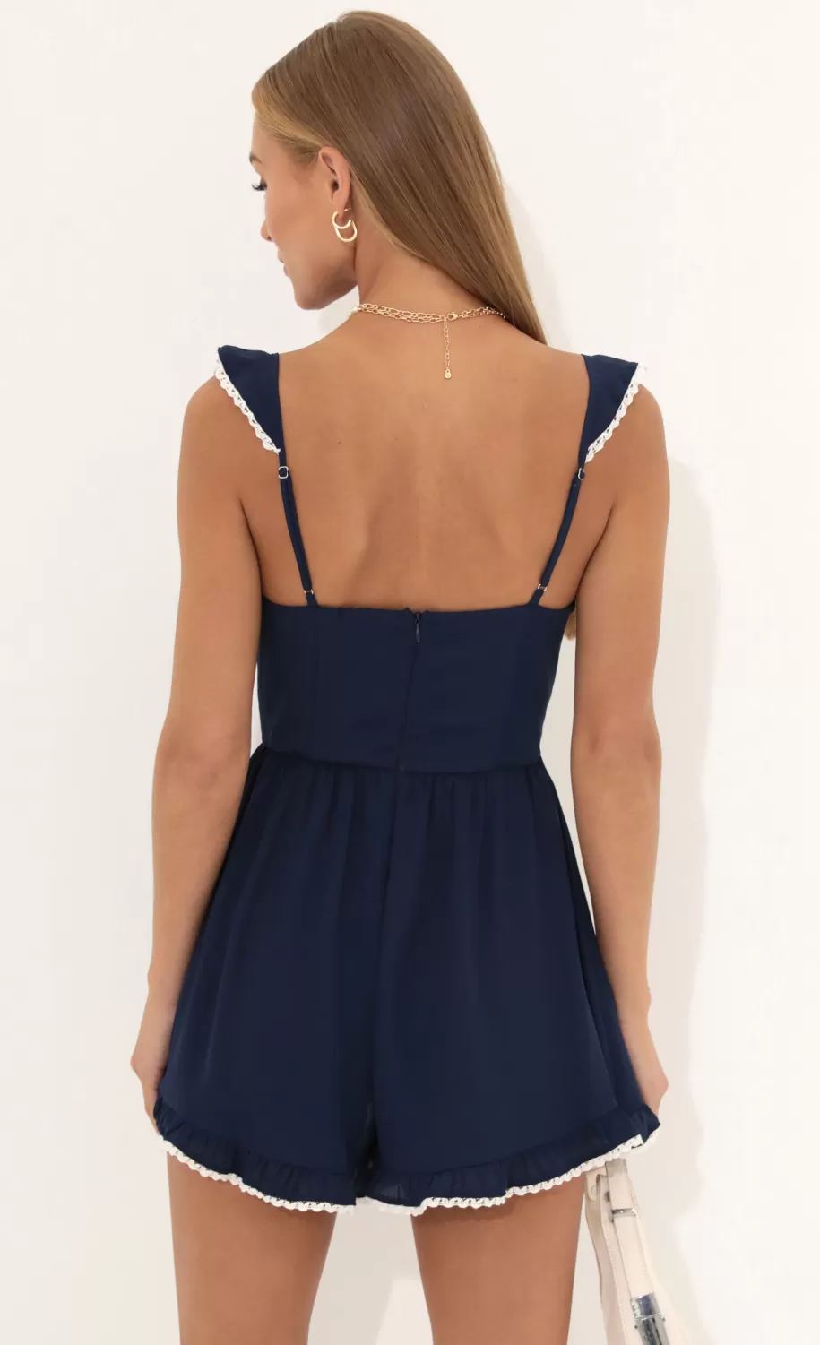 Jane Wooldoby Ruffle Romper In Navy^LUCY IN THE SKY Shop